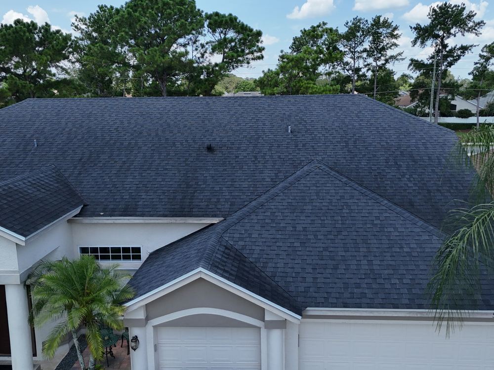 Completed asphalt shingle roof on a Central Florida home installed by AlphaCore Roofing