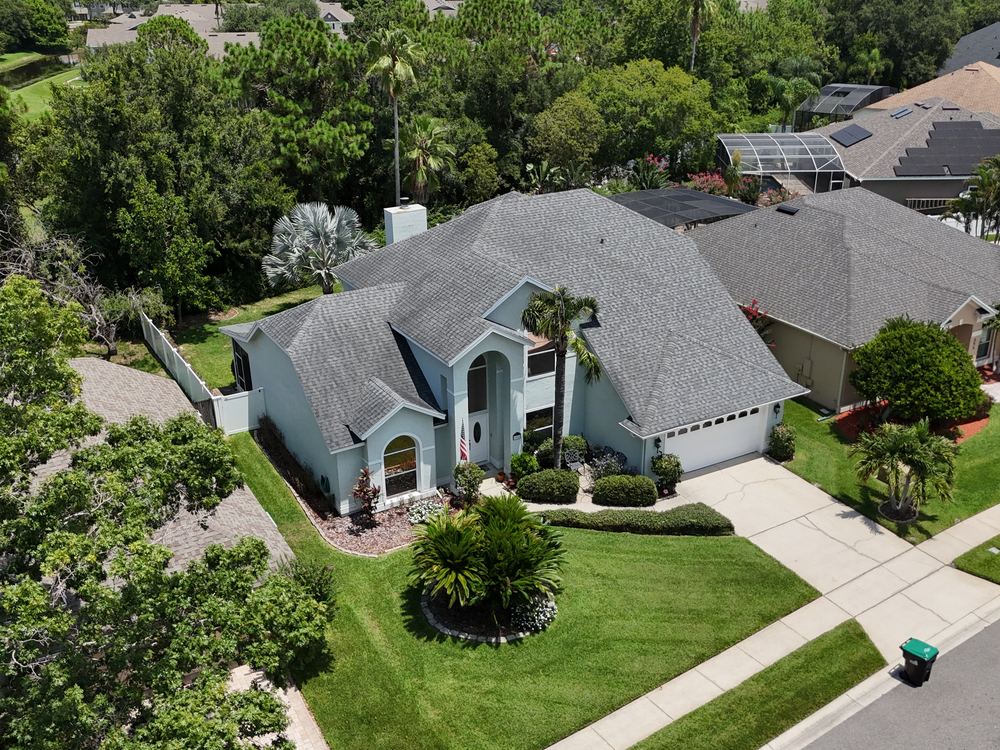 Completed shingle roof on a Central Florida home installed by AlphaCore Roofing