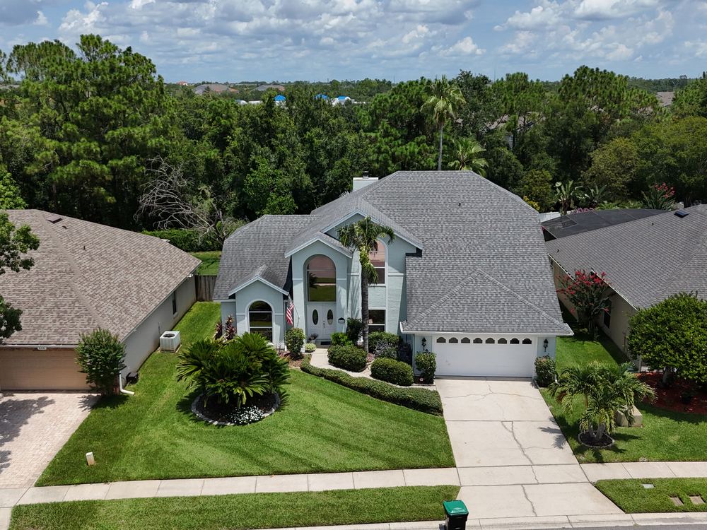 Finished architectural shingle roof on a Central Florida home installed by AlphaCore Roofing