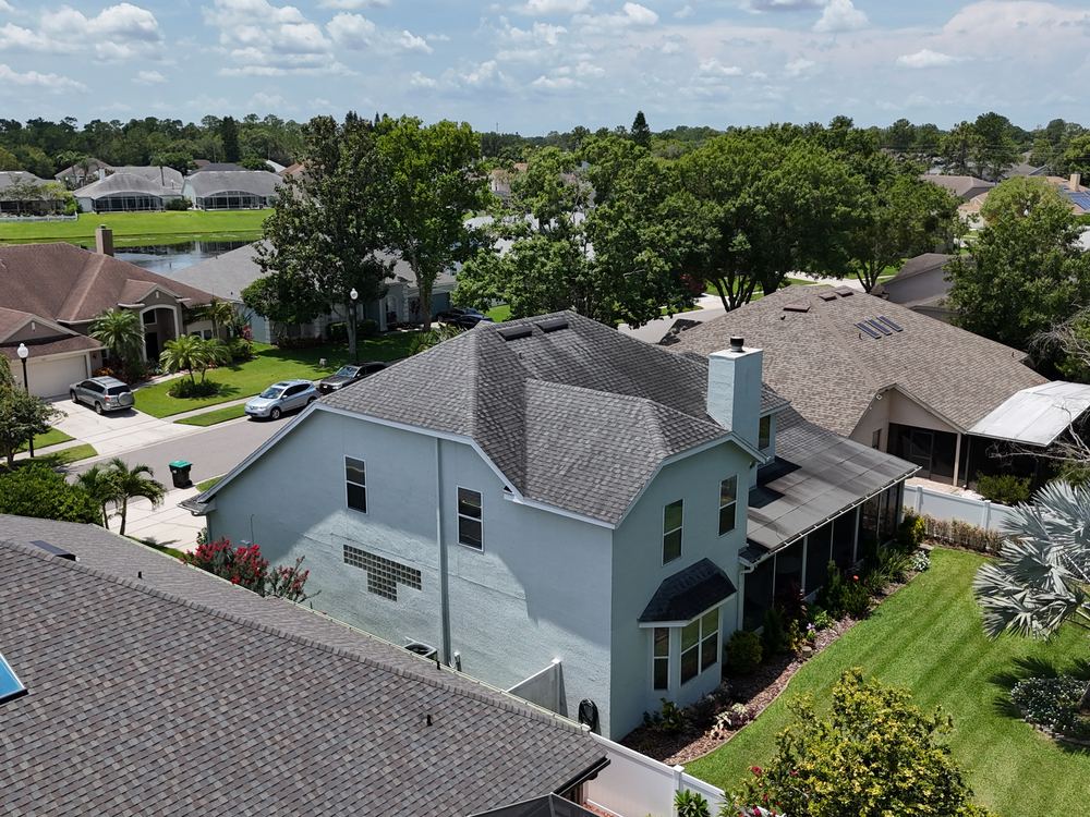 Finished roof replacement on a two story Central Florida home installed by AlphaCore Roofing
